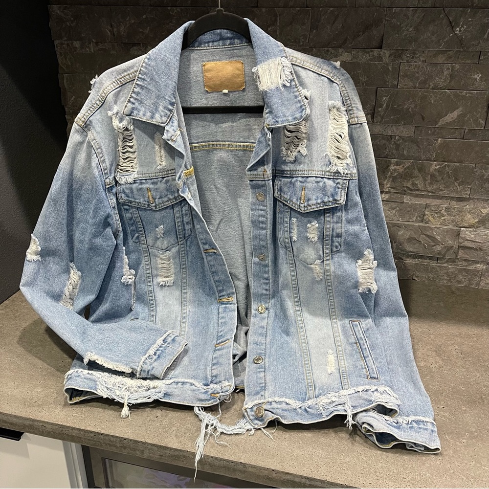 Distressed jean jacket